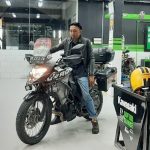 Riding from Pekanbaru to Bagan Batu through rain on the Trans-Sumatra Highway during Touring Indonesia Harmoni